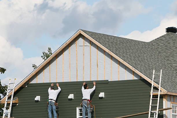 Professional Siding technician working in Bradenville, PA